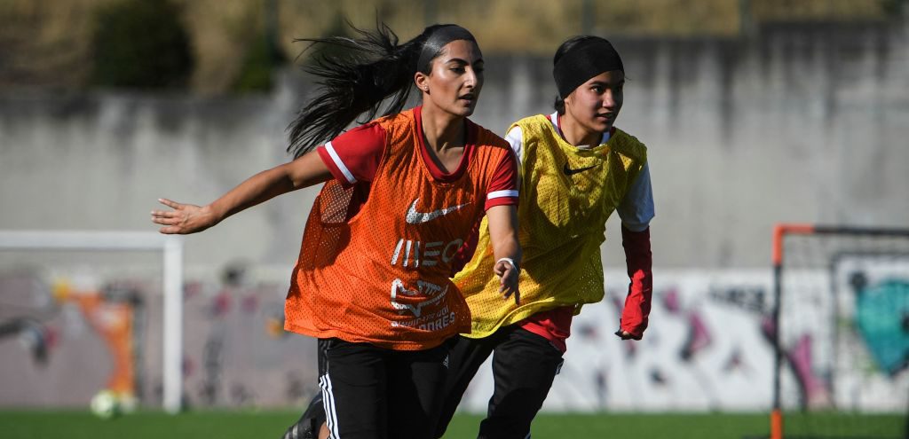 Forced to flee Afghanistan after the Taliban came to power, players of the Afghan women's national football team practice in a suburban stadium of Lisbon in 2021