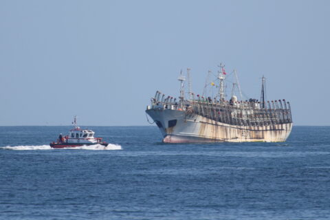 A Chilean maritime patrol vessel approaches a Chinese-flagged fishing boat off the northern coast, amid a surge in port call requests from Chinese vessels and growing concerns from local fishing and environmental groups over potential overfishing, according to Chile's Navy and local media, near Iquique, Chile, October 9, 2025. REUTERS/Alex Diaz
