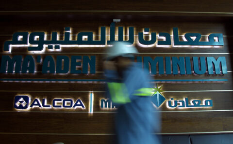 A Saudi labourer walks at Maaden Aluminium in Ras Al Khair, Saudi Arabia