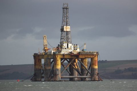Oil rig. big polluters clean energy