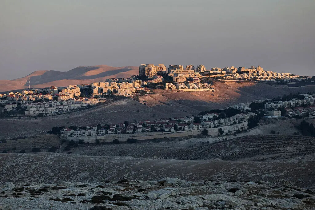 A populated area over a hill