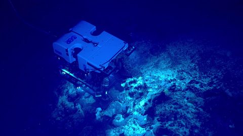 NOAA's Okeanos Explorer ship carrying out a mapping expedition in an unknown area of the deep ocean floor.